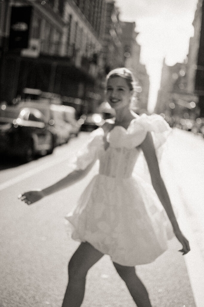 A bride in the streets of Paris in a mini wedding dress, before her elopement.