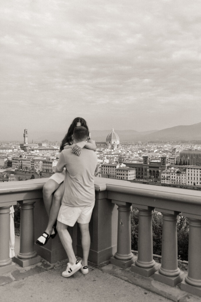 A destination engagement session in Florence, Italy at Piazzale Michelangelo. By Bridget Photography